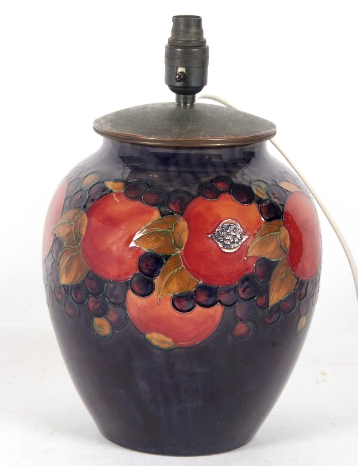 A large Moorcroft pomegranate lamp base, the top with metal cover, the lamp base 30cm high with - Image 3 of 4