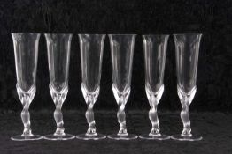 A set of Carl Faberge crystal glass champagne flutes, the bowls mounted on frosted kissing doves