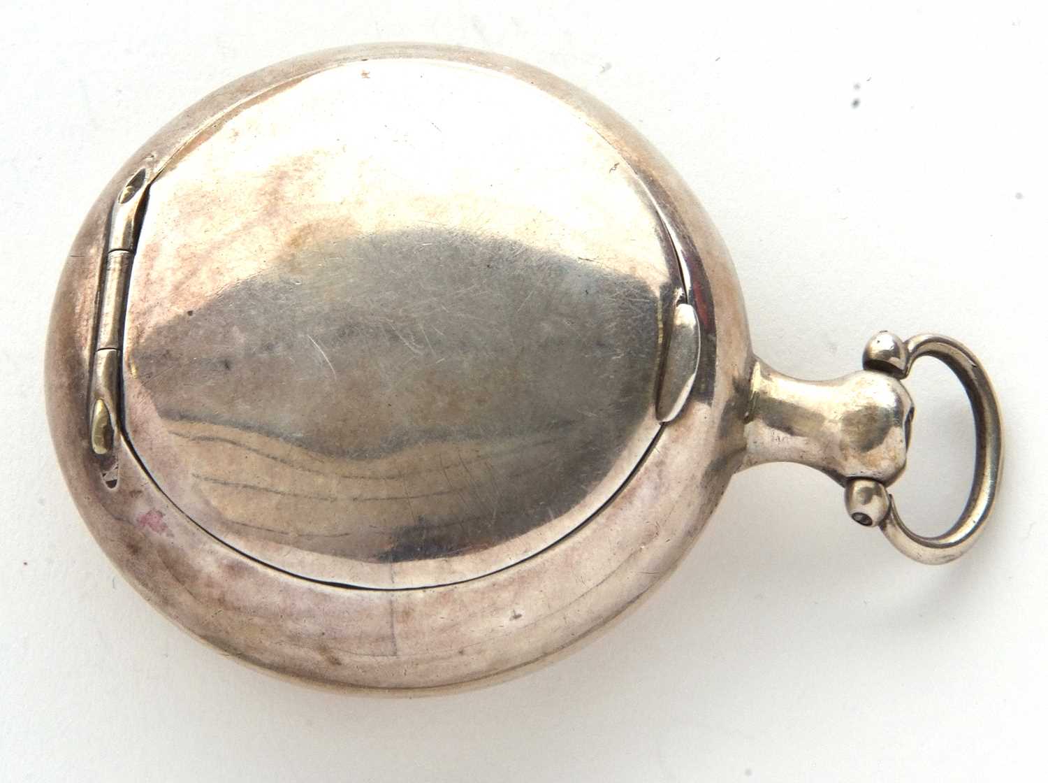 A George III silver snuff box in the form of a pocket watch case of plain circular form, the verso - Image 3 of 7