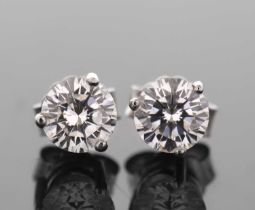 A pair of diamond earstuds, the round brilliant cut diamonds, estimated approx. 0.63cts each (1.