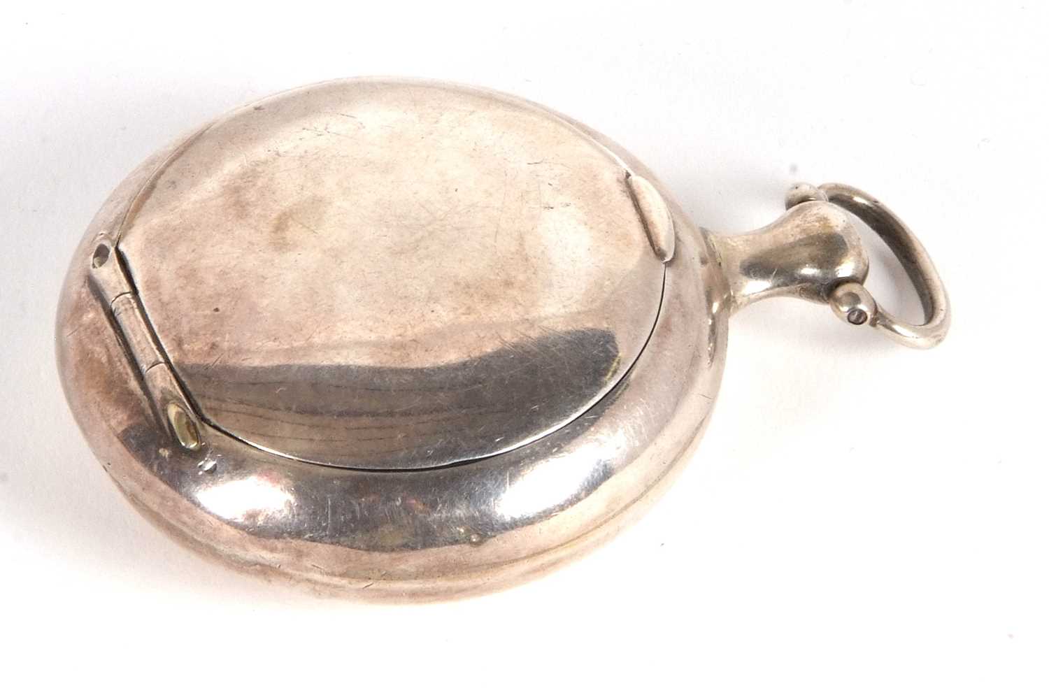 A George III silver snuff box in the form of a pocket watch case of plain circular form, the verso - Image 2 of 7