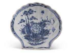 A Bow porcelain pickle dish of fluted form raised on two stub feet with blue and white design,