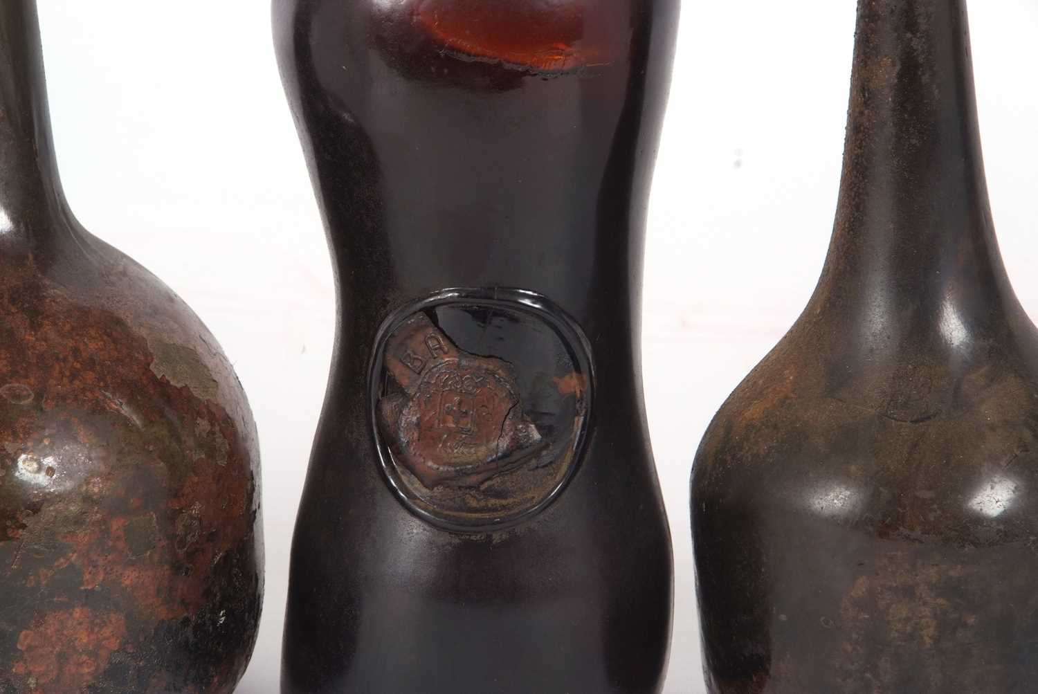 A group of three 18th Century wine bottles, one of onion shape, a further bottle of double gourd - Image 3 of 3