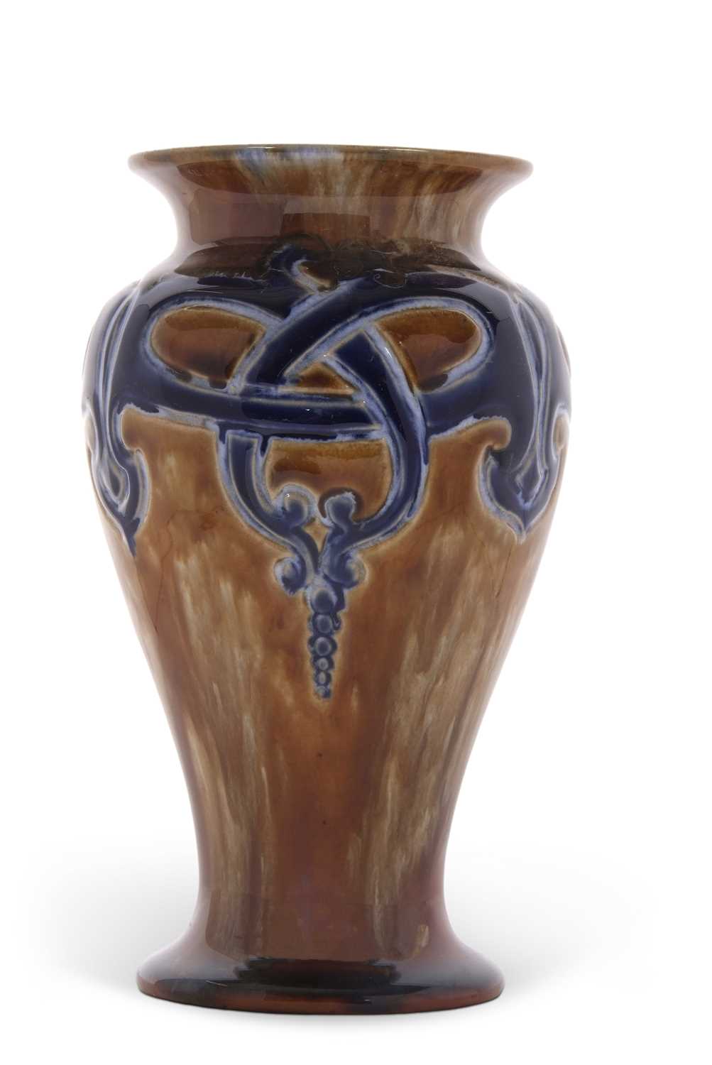 A Royal Doulton vase by Frank Pope, of baluster shape the brown ground with a blue Art Nouveau style