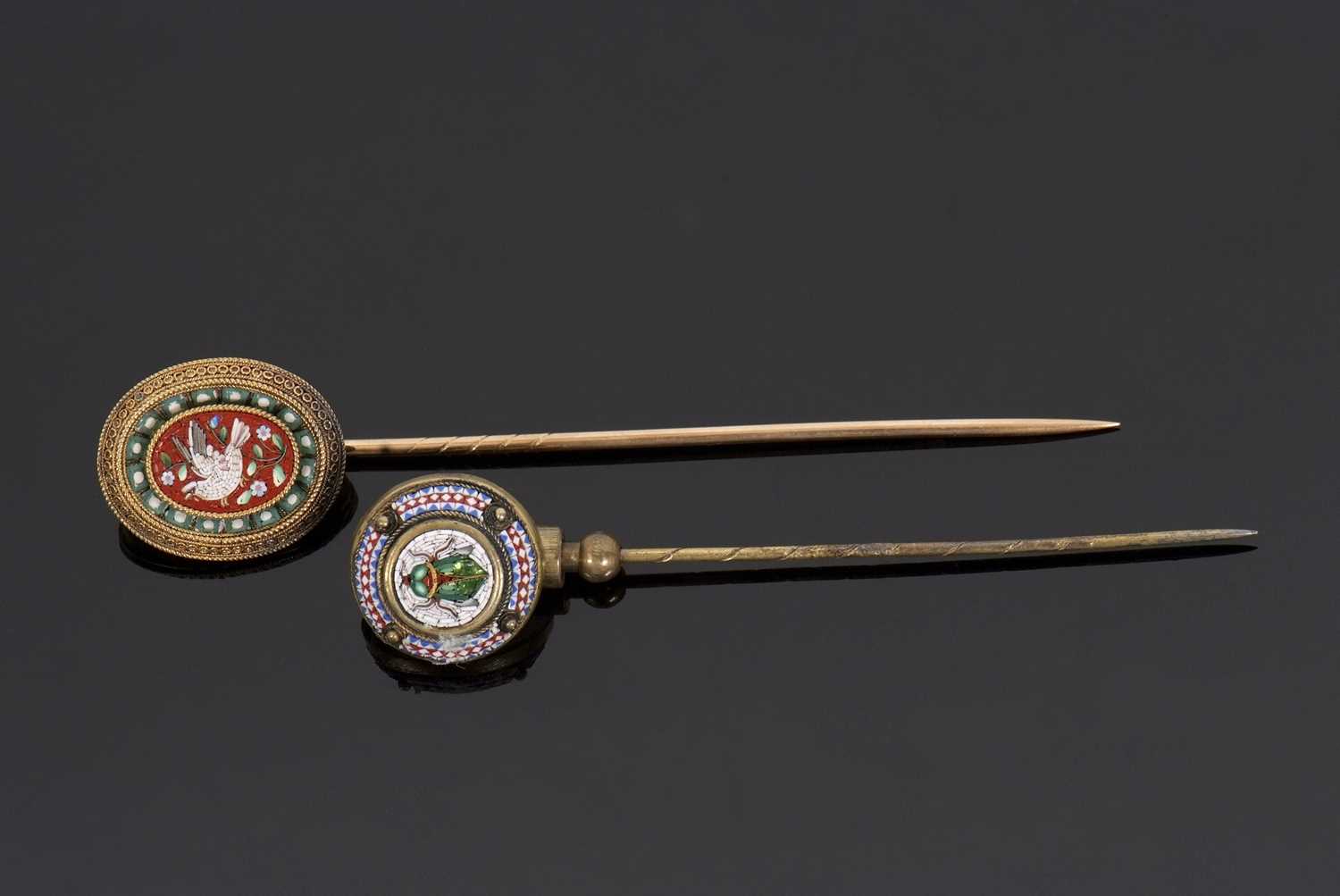 Two 19th century micro mosaic stick pins, the first with an oval head with dove of peace and green