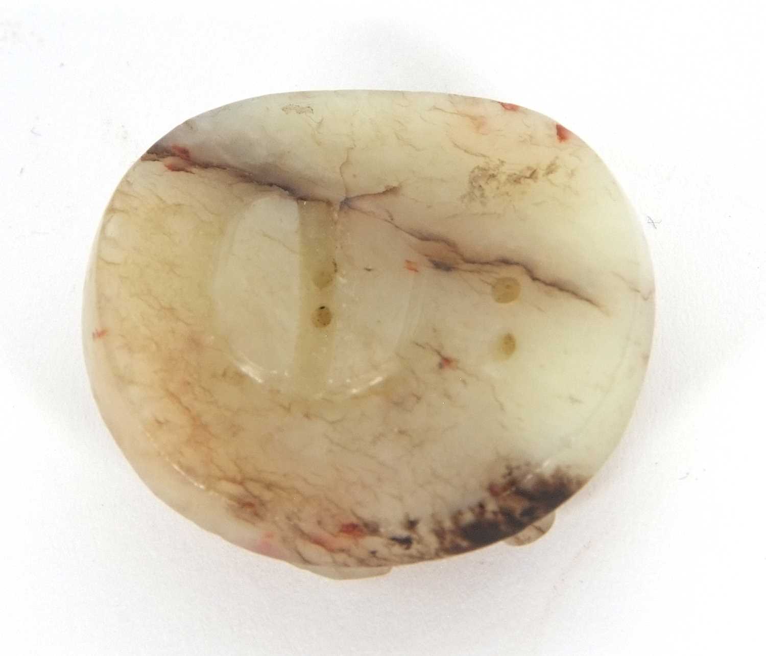 A jade pendant with dragon carving with brown occlusions, 4cm diameter - Image 6 of 6