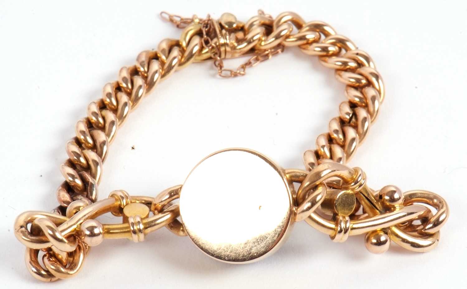 A late 19th century 15ct garnet bracelet, set to centre with a round garnet cabochon with a split - Image 4 of 6