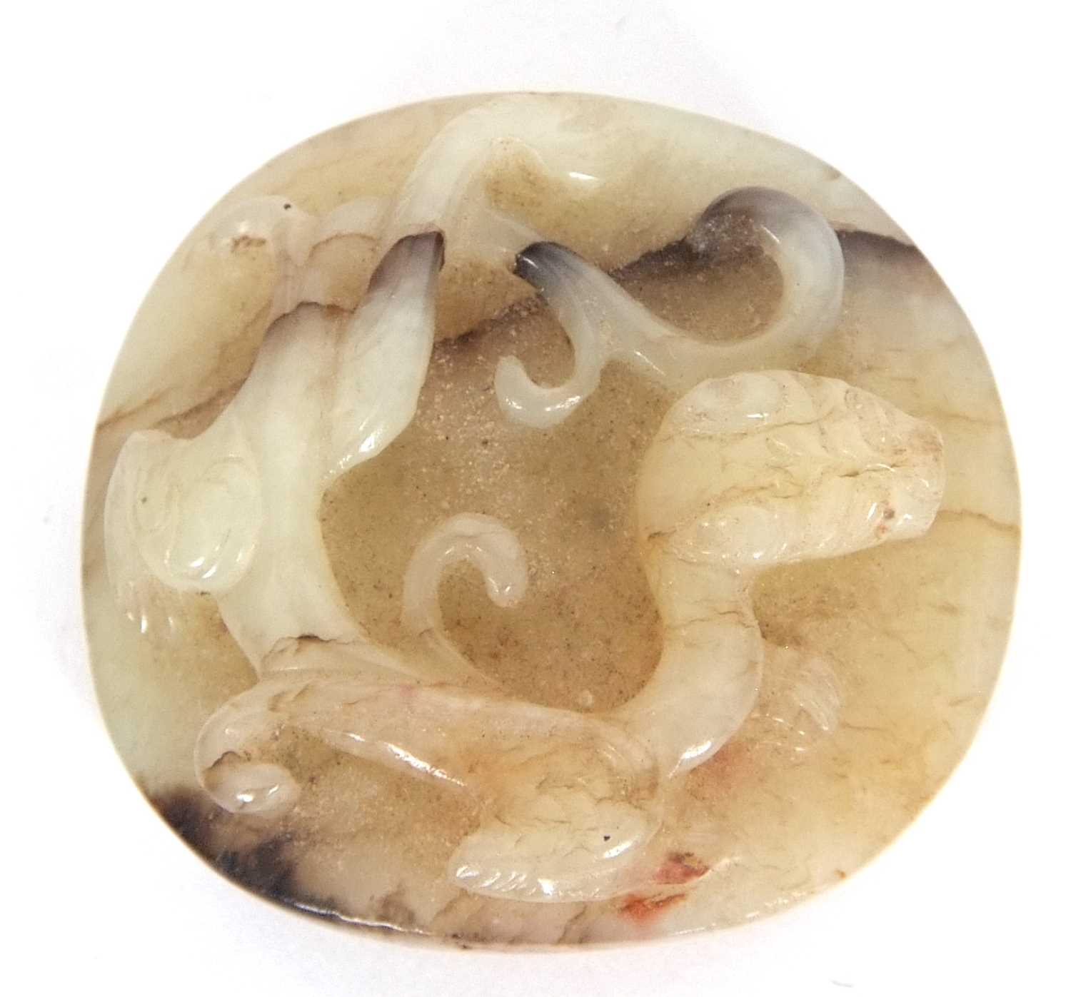 A jade pendant with dragon carving with brown occlusions, 4cm diameter - Image 5 of 6