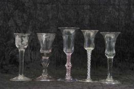 A group of 18th/19th Century wine glasses, probably Dutch including a ruby coloured twist glass with