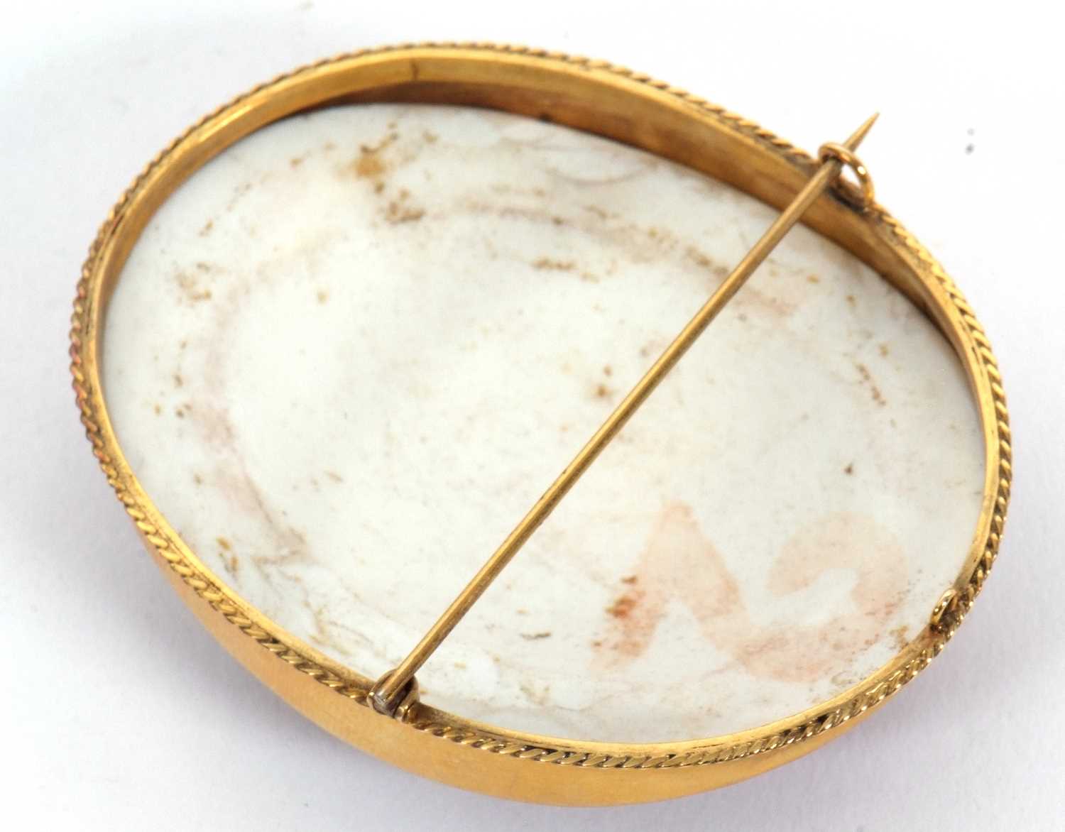 A 19th century continental portrait brooch, the oval Sevres style portrait of a royal lady with dark - Image 3 of 3