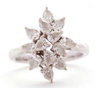 An 18ct diamond cluster ring, set with twelve marquise brilliant cut diamonds, total 1.55cts, all