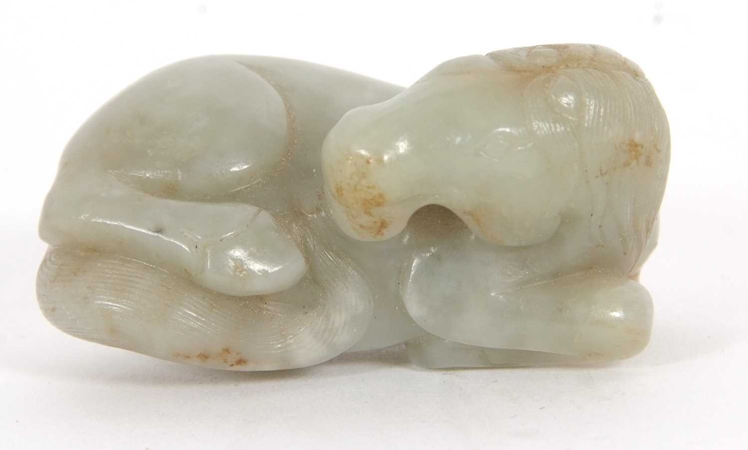 A jade carving of a horse with some brown occlusions, 6cm long - Image 2 of 5