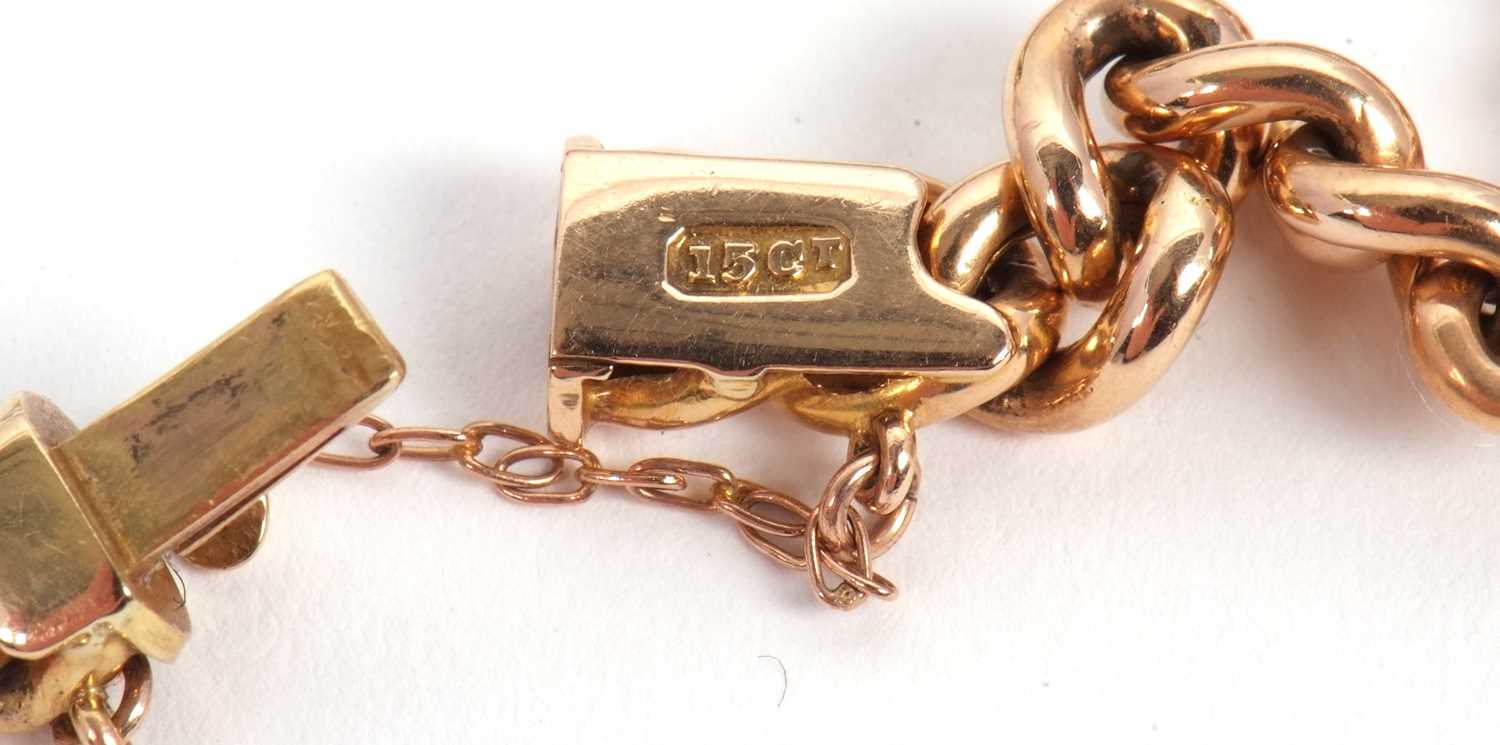 A late 19th century 15ct garnet bracelet, set to centre with a round garnet cabochon with a split - Image 6 of 6