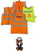 A collection of various worn Motor Racing Marshall hi-viz vests, together with 2 paris of ear