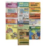 A collection of various 1970s Asterix comic books