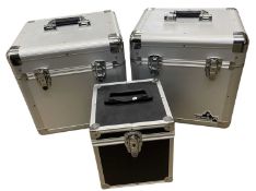 Three vinyl storage cases.