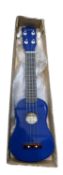 A boxed Falcon ukulele in blue
