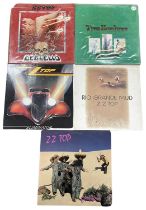 Five ZZ Top 12" vinyl LPs, to include: - Eliminator, 1983, WB, 92-3774-1 - Rio Grande Mud, 1980, WB,