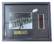 A framed limited edition film cell presentation display for THE DIRTY DOZEN, with black and white