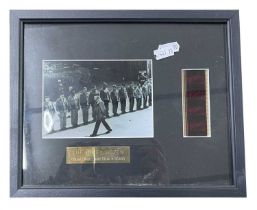 A framed limited edition film cell presentation display for THE DIRTY DOZEN, with black and white