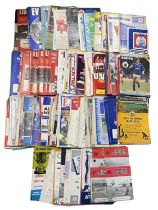 A collection of various vintage football programmes from the 1950s - 1980s, including assorted FA