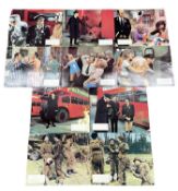 A set of 8 Mutiny On The Buses lobby cards, plus 2 others