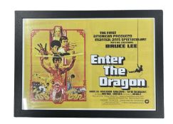 A reproduction film poster (most likely from a magazine/newspaper), for Enter the Dragon starring