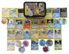 A Mewtwo Pokemon collector's tin, containing a quantity of early 2000s Pokemon cards, handmade