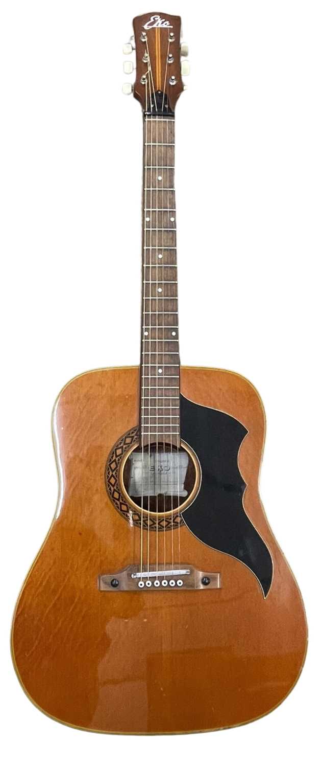 An Eko Ranger VI acoustic guitar. Some light scratching to body and a chip to veneer of