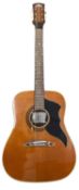 An Eko Ranger VI acoustic guitar. Some light scratching to body and a chip to veneer of