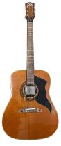 An Eko Ranger VI acoustic guitar. Some light scratching to body and a chip to veneer of