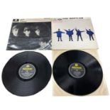 A pair of BEATLES 12" vinyl LPs, with black and yellow Parlophone labels, to include: - HELP! - With