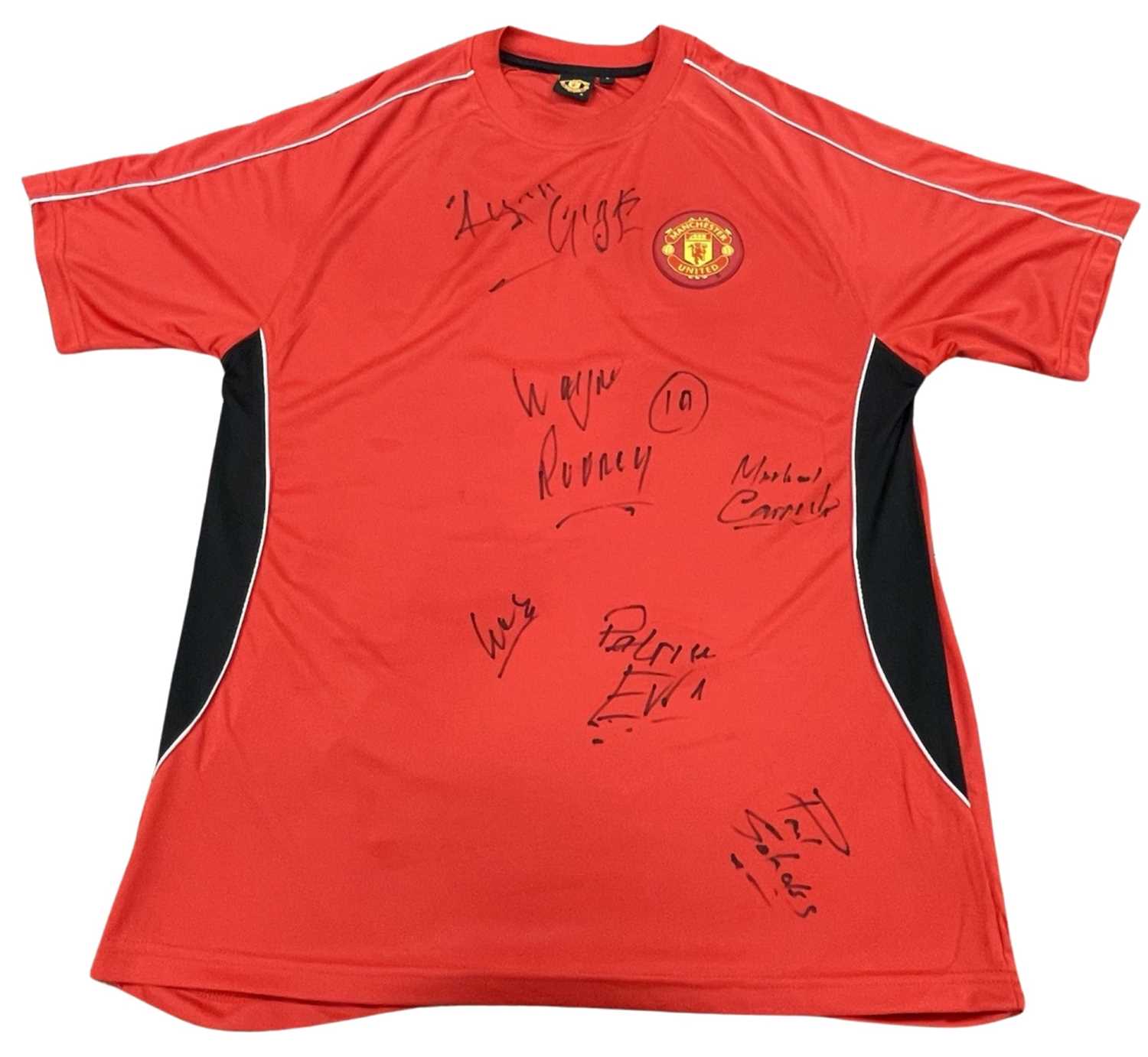 An official Manchester United shirt, bearing the signatures of: - Ryan Giggs - Wayne Rooney - Paul