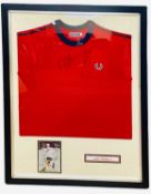 A framed Fred Perry t-shirt and photograph, bearing the signature of tennis player, Andy Murray.