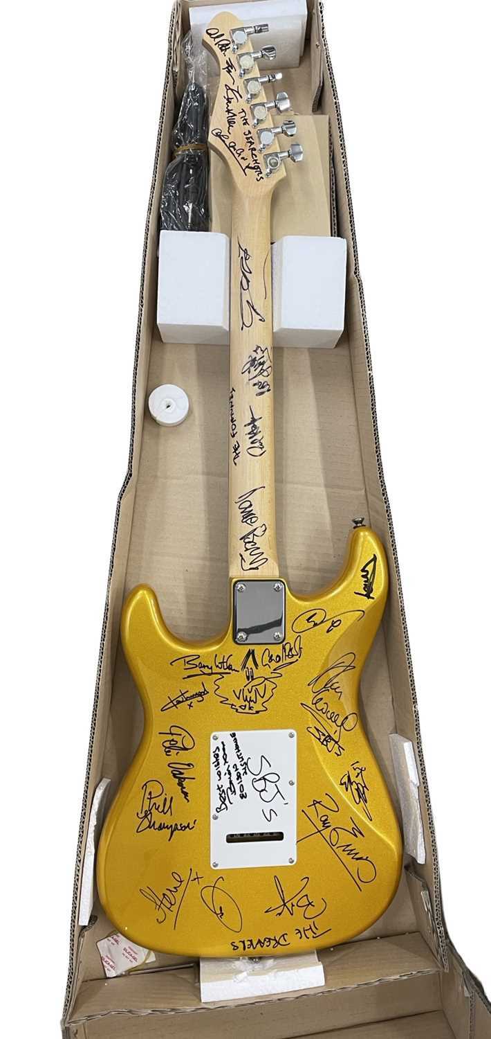 An Aria electric guitar, bearing the signatures of various 1960s bands in black ink, to include: - - Image 2 of 5