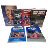 A collection of Grand Prix interest books, each bearing the signature of motorsport commentator,