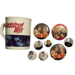 A collection of 1990s boyband merchandise, including Backstreet Boys and Take That