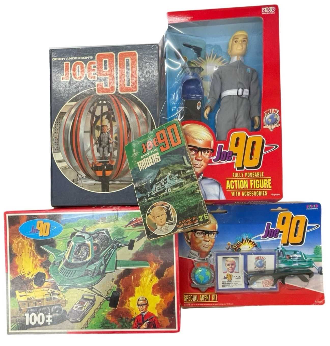 A collection of vintage Joe 90s memorabilia, to include action figure, annual, puzzle, novel and