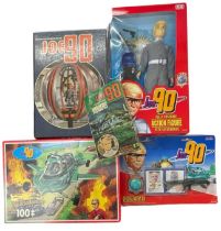 A collection of vintage Joe 90s memorabilia, to include action figure, annual, puzzle, novel and