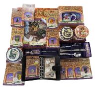 A mixed lot of various Harry Potter memorabilia, to include wall clock, pin badges, Gringott's