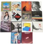 A mixed lot of rock 12" vinyl LPs, to include: - Bruce Springsteen: Darkness on The Edge of Town -