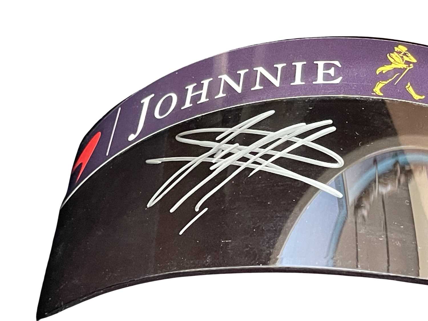 F1 interest: A helmet visor bearing the signatures of Fernando Alonso and Stoffel Vandoorne in - Image 2 of 3