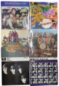 Six Beatles 12" vinyl LPs, to include: - Sgt Pepper's Lonely Hearts Band (1 record) - Yellow