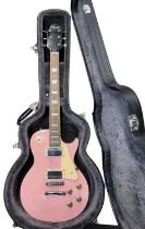 A Nevada Les Paul style electric guitar in baby pink, with fitted lined hardcase (not original to