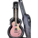 A Nevada Les Paul style electric guitar in baby pink, with fitted lined hardcase (not original to