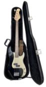 A Nevada bass guitar in black lined hardcase.