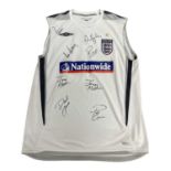 An England football tank top, bearing the signatures of: - David Beckham - Rio Ferdinand - David