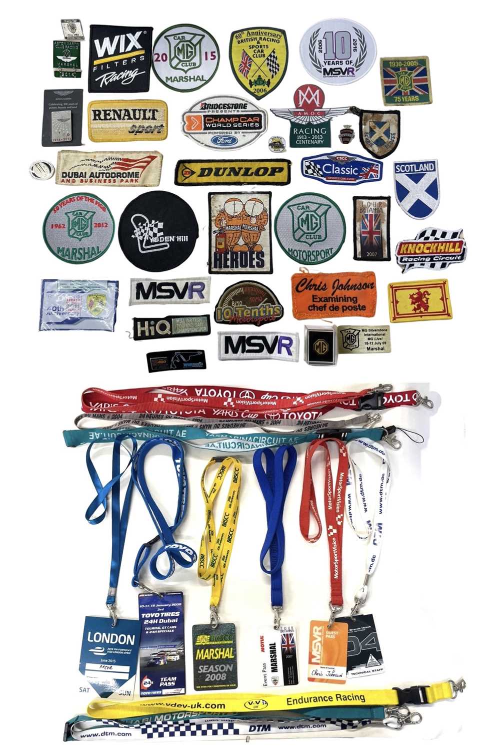 A collection of vintage British Racing patches and pin badges, together with a collection of British