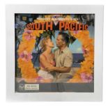 A framed 12" vinyl sleeve for Rogers and Hammerstein's South Pacific. Framed size approximarely: