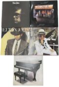 Five Elton John 12" vinyl LPs, to include: - Greatest Hits, DJLPH 442 - Here and There, DJLPH